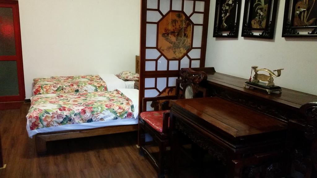 Tiananmen Best Year Courtyard Hotel Peking Rum bild